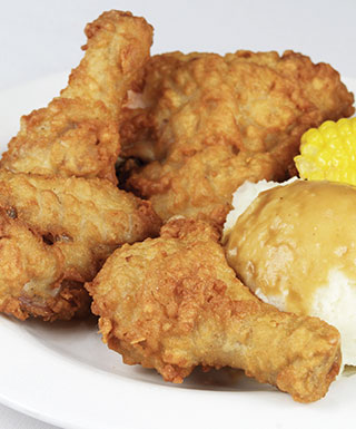 Fried chicken, corn, and mashed potatoes at the Captain