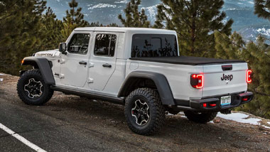 White Jeep Gladiator with Mountain Background