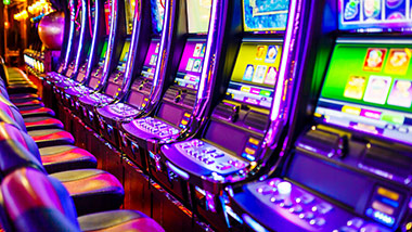 close up of row of slot machines