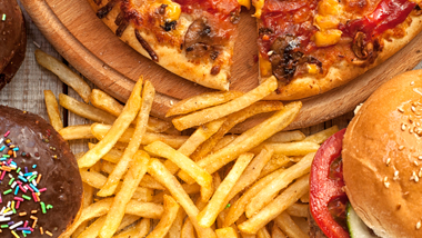collage of food with pizza, fries and hamburger