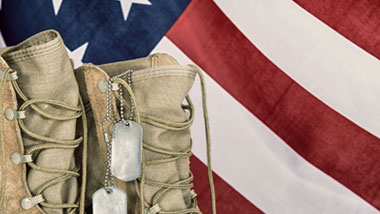 american flag, military boots and dog tags